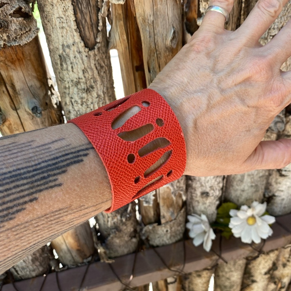 Red leather cuff bracelet with cut outs